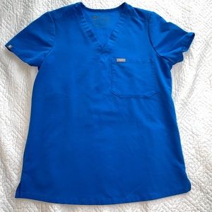 Used Figs one-pocket scrub top in royal blue